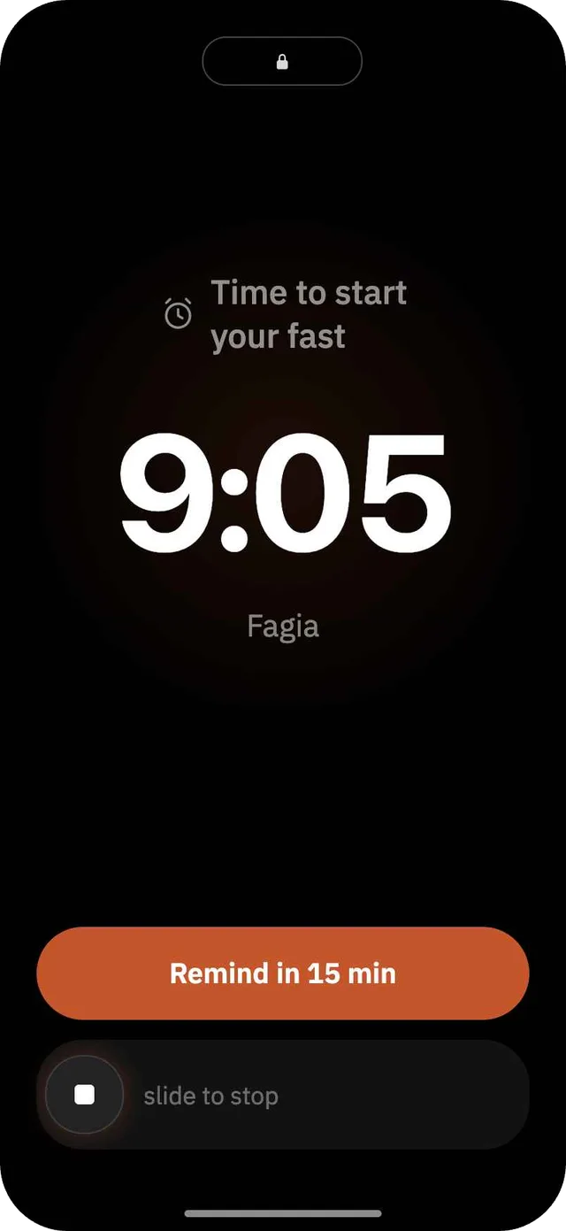 Fagia lock screen alert reminding the user to start their fasting window, with controls to snooze or stop it.
