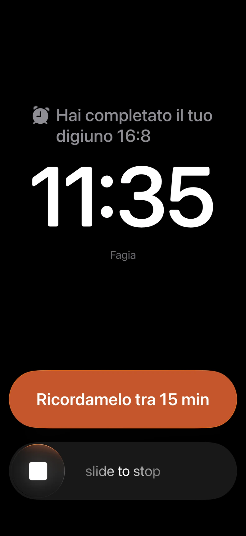 Sveglia Fagia al termine di un digiuno 16:8, con opzioni per un promemoria tra 15 minuti o per fermare la sveglia.